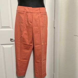 Coral slacks. Ankle length.
